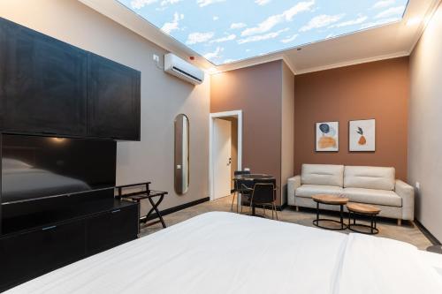 En eller flere senge i et værelse på דירות על הים - קויפמן