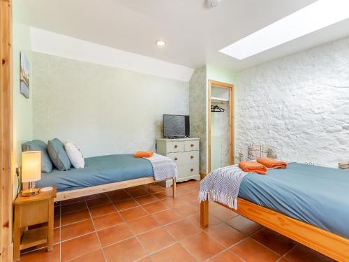 Ένα ή περισσότερα κρεβάτια σε δωμάτιο στο Canisp Studio Apartment - Uk49099