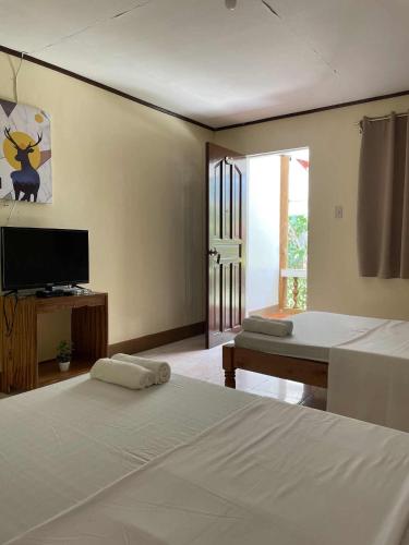 Postel nebo postele na pokoji v ubytování Bocala Beach Resort