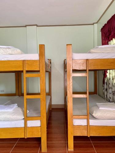 Postel nebo postele na pokoji v ubytování Bocala Beach Resort