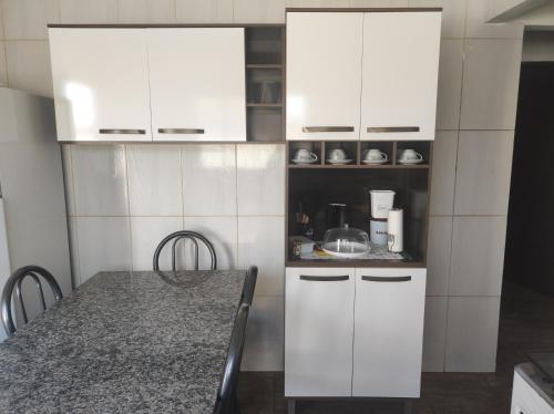 Kuchyň nebo kuchyňský kout v ubytování Casa do Trevo
