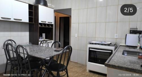Kuchyň nebo kuchyňský kout v ubytování Casa do Trevo