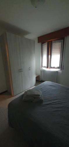 Postel nebo postele na pokoji v ubytování valtellinadeicech