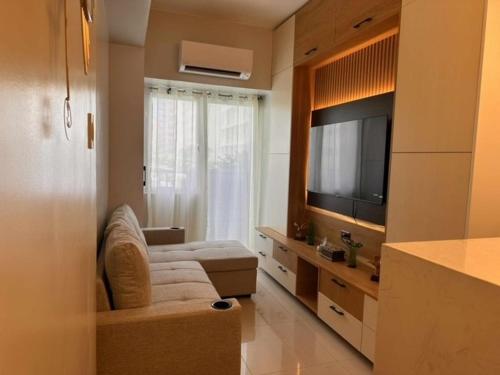 TV a/nebo společenská místnost v ubytování Eu & El Condo