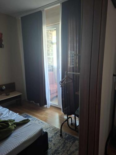 Cama ou camas em um quarto em H&A Apartament