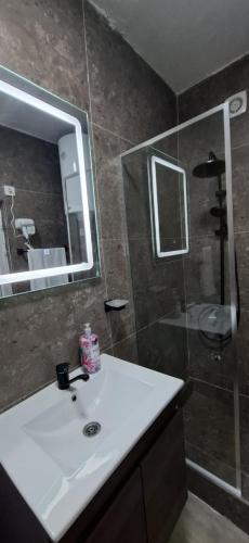 Um banheiro em H&A Apartament