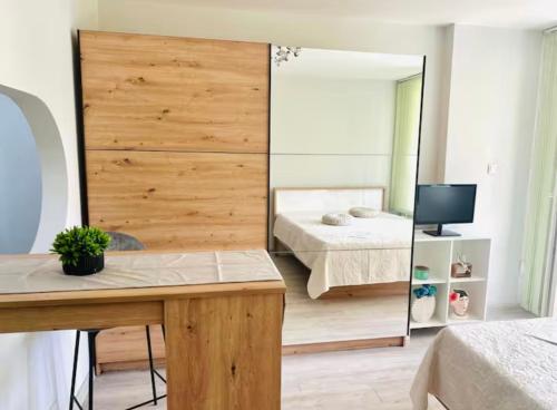 Ένα ή περισσότερα κρεβάτια σε δωμάτιο στο MitrovicHouse