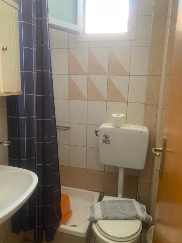 Ένα μπάνιο στο Hotel Exarhos