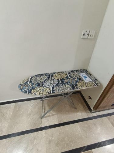 a mattress on a table in a room at RMT Residencia per room in Peshawar