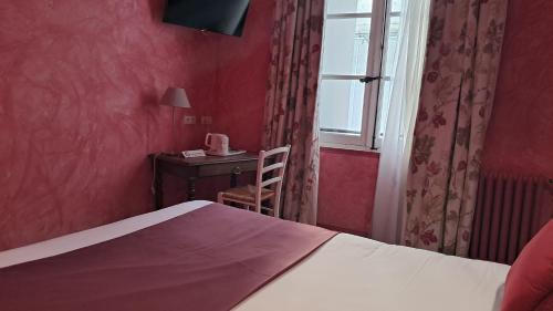 Katil atau katil-katil dalam bilik di Hôtel du Palais