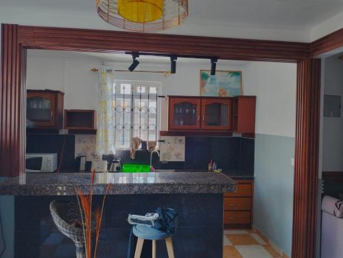 a kitchen with a counter top in a room at Azure nest in Cap Malheureux