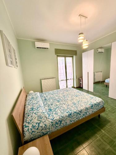 a bedroom with a bed in a room at Casa del Sogno in Ladispoli