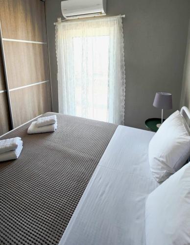 Postel nebo postele na pokoji v ubytování Sitia Bay View Villa Apartment