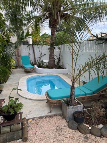 Kolam renang di atau dekat dengan Maison avec piscine et rooftop à la Preneuse - 5min de la plage