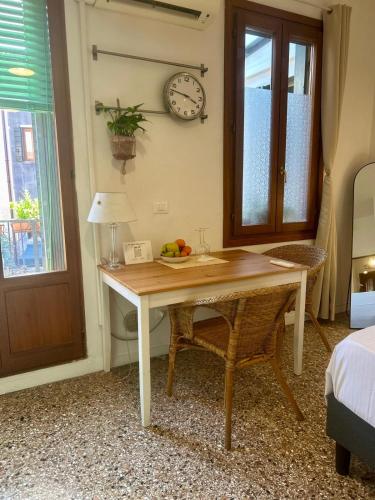 Ένα ή περισσότερα κρεβάτια σε δωμάτιο στο Venetian Experience