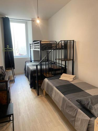 Ένα ή περισσότερα κρεβάτια σε δωμάτιο στο Viale XX settembre 68