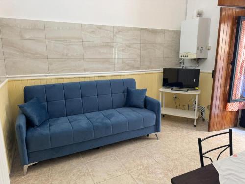 TV a/nebo společenská místnost v ubytování Da nonno filuccio