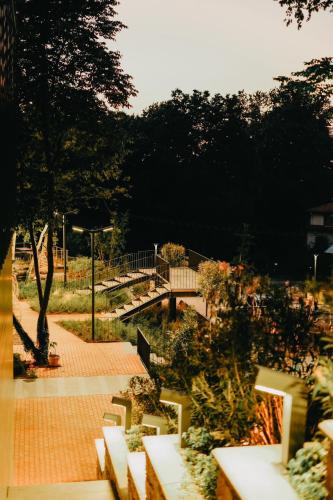 a view of a park with benches and trees at Melekona House in Kartepe