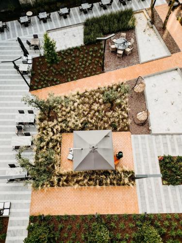 an overhead view of a patio with an umbrella at Melekona House in Kartepe