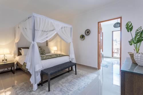Ένα ή περισσότερα κρεβάτια σε δωμάτιο στο Fort View Luxury Accommodation