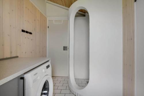 a laundry room with a washer and dryer at G608-Lemvig-Gyvelvej-8 in Lemvig