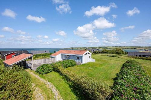 an aerial view of a house with the ocean in the background at G608-Lemvig-Gyvelvej-8 in Lemvig