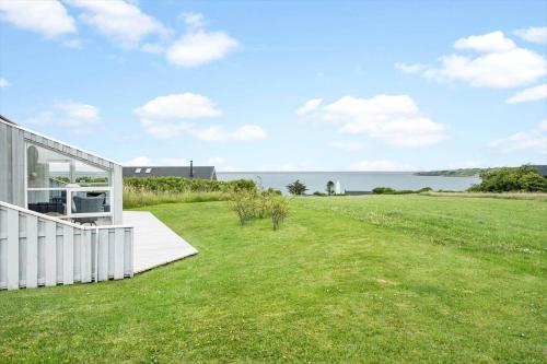 a glass house with a view of the ocean at G608-Lemvig-Gyvelvej-8 in Lemvig