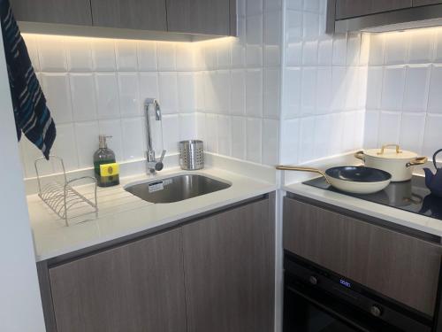 Η κουζίνα ή μικρή κουζίνα στο Studio 2 minutes from Ñuñoa Metro in the best neighborhood