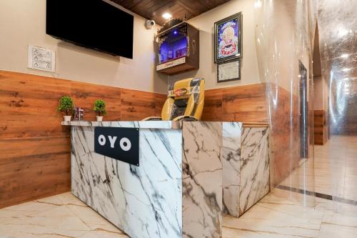 Μια τηλεόραση ή/και κέντρο ψυχαγωγίας στο Hotel O Shri Panchmukhi Residency Baran Road