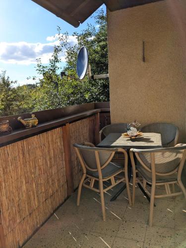 a table and chairs sitting on a patio at Villa Viola 
