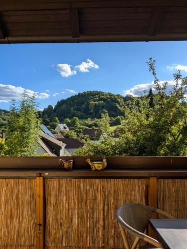 a view from a balcony with a table and a chair at Villa Viola 