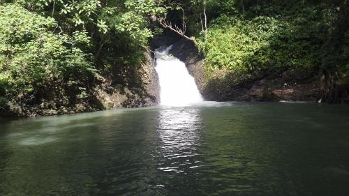 a waterfall in the middle of a body of water at Luxury apartmеnt with private terrace in Altos del Maria in Sorá