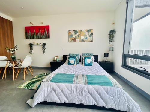 Postel nebo postele na pokoji v ubytování Loft Reforma Embassy USA