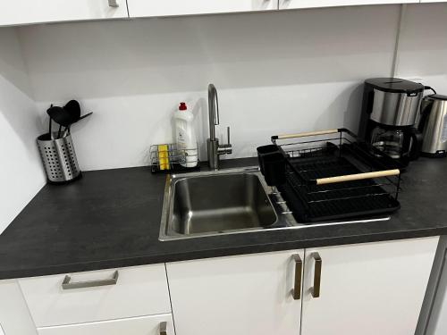 Dapur atau dapur kecil di CityStay Bergisch Gladbach Apartments & Rooms