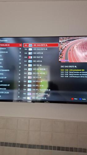 TV a/nebo společenská místnost v ubytování Apartment Fabiola Hamberg strasse 34 in Siegen