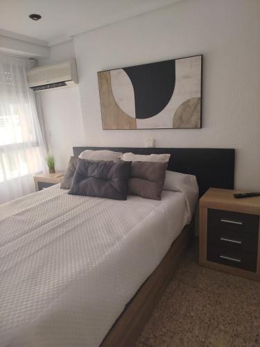 Postel nebo postele na pokoji v ubytování Apartamento junto al Club Nautico