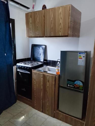 Kuchyň nebo kuchyňský kout v ubytování Studio meublé