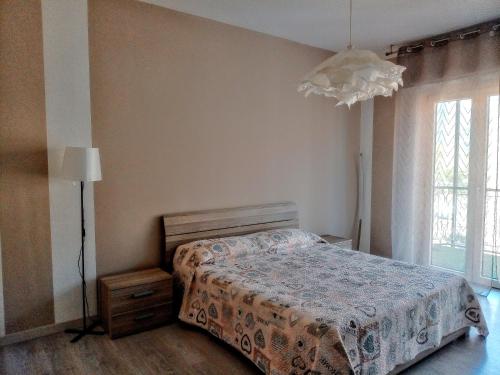 Ένα ή περισσότερα κρεβάτια σε δωμάτιο στο Apartment in Domodossola next to the station