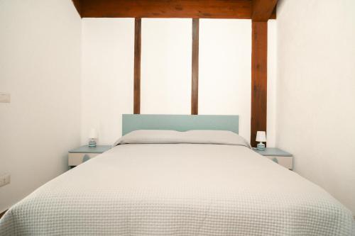 En eller flere senge i et værelse på Azienda Agricola Bontà della Terra