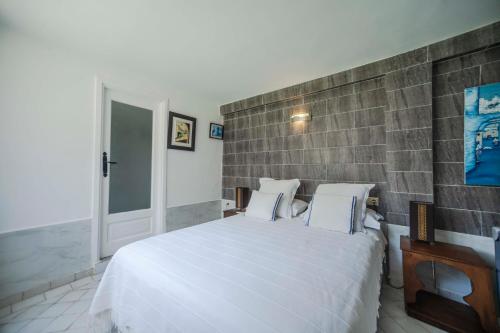 Postel nebo postele na pokoji v ubytování Studio Appartement Perdicaris