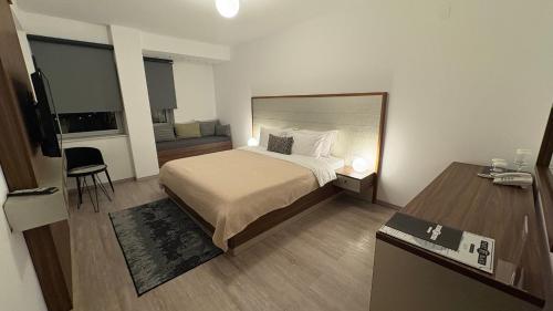 TV a/nebo společenská místnost v ubytování Paint It Black Hotel & Spa