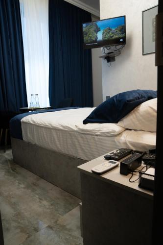 TV a/nebo společenská místnost v ubytování Prime Suites Hotel