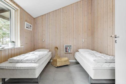 Ένα ή περισσότερα κρεβάτια σε δωμάτιο στο 2261-Ringkobing-Klitsvinget-36