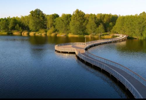 a bridge over a body of water at Apartament 35 Tuchola in Tuchola