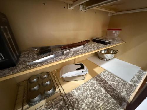 a kitchen with a counter top with aounter at Happy Place in Port Saint Lucie
