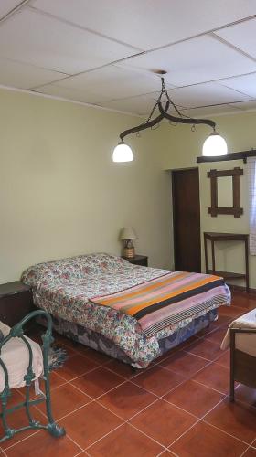 Postel nebo postele na pokoji v ubytování Casa los Molles Hostel