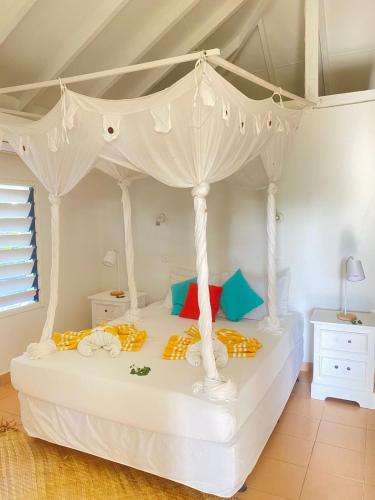 Postelja oz. postelje v sobi nastanitve Coco Beach Resort