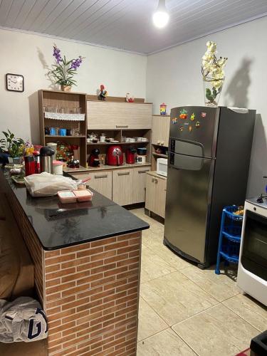 Dapur atau dapur kecil di Casa com piscina