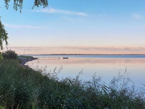 a view of a body of water with a dock at 6 person holiday home in Farsø-By Traum in Farsø