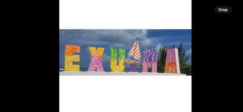 a picture of a fence with colorful flags at All Decked Out, Exuma in Georgetown
